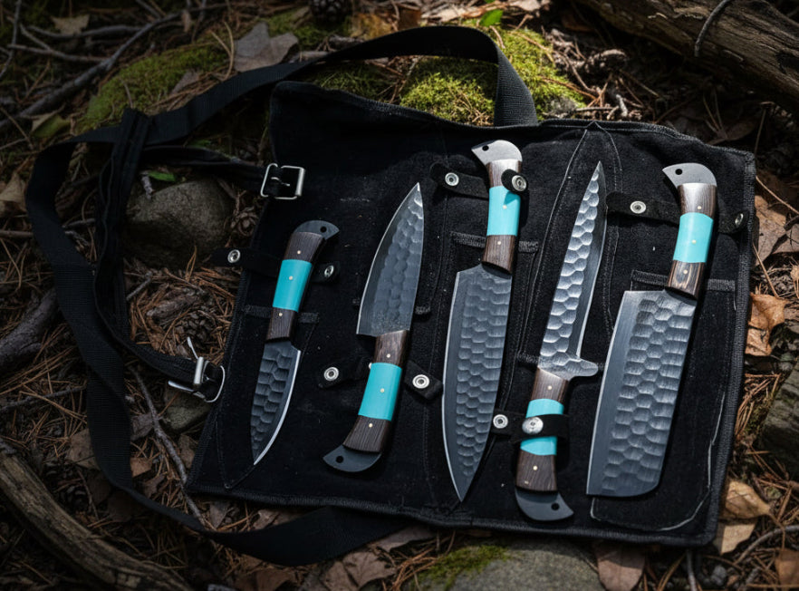 Set of knives in a black sheath with faux turquoise accents in an outdoor background