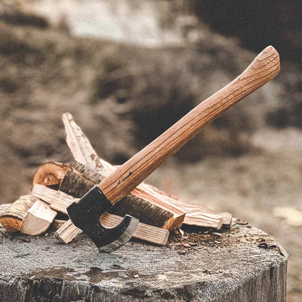 Roselli R850D The Axe, Long handle Red Elm Handle Nordic Axe on a log pile outdoors.