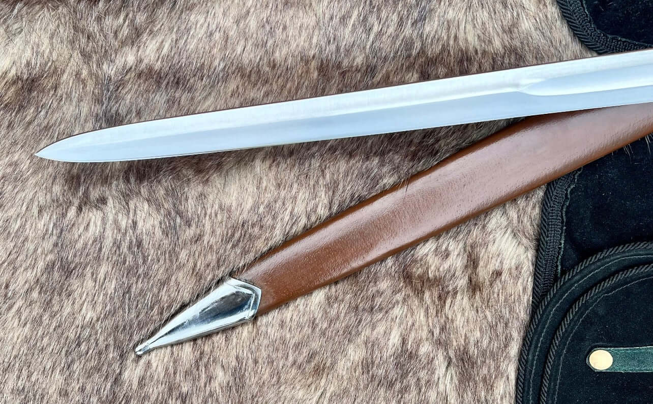 Renaissance Battle Sword Sidesword blade and hilt detail on textured fur background.