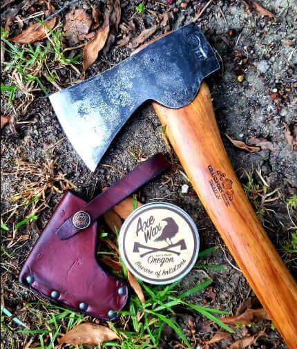 Why Handmade Axes Are Every Warrior’s Dream?? featuring a handmade axe, axe wax, and leather axe sheath.