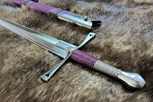 The Genoa vs. The World: Why This Italian Bastard Sword is the Professional's Choice displayed on a fur background.