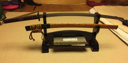 Japanese katana swords displayed on a stand, showcasing their elegance, symbol of samurai culture, Why Japanese Katana.
