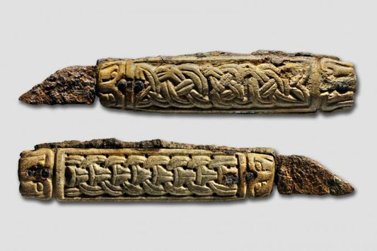 Viking Folding Knife: A Noble Weapon of the Medieval North with intricate carvings.
