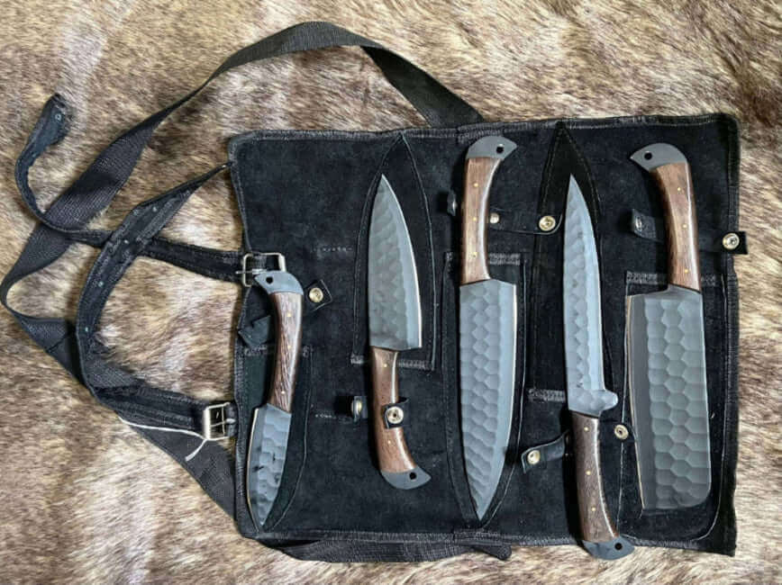 Why Choose Handmade Kitchen Knives - Know before you Buy, display of assorted handmade kitchen knives in a roll.