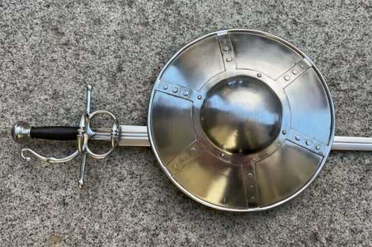 Sidesword and Buckler Effectiveness in Late Medieval Combat displayed with a polished sword and round buckler.