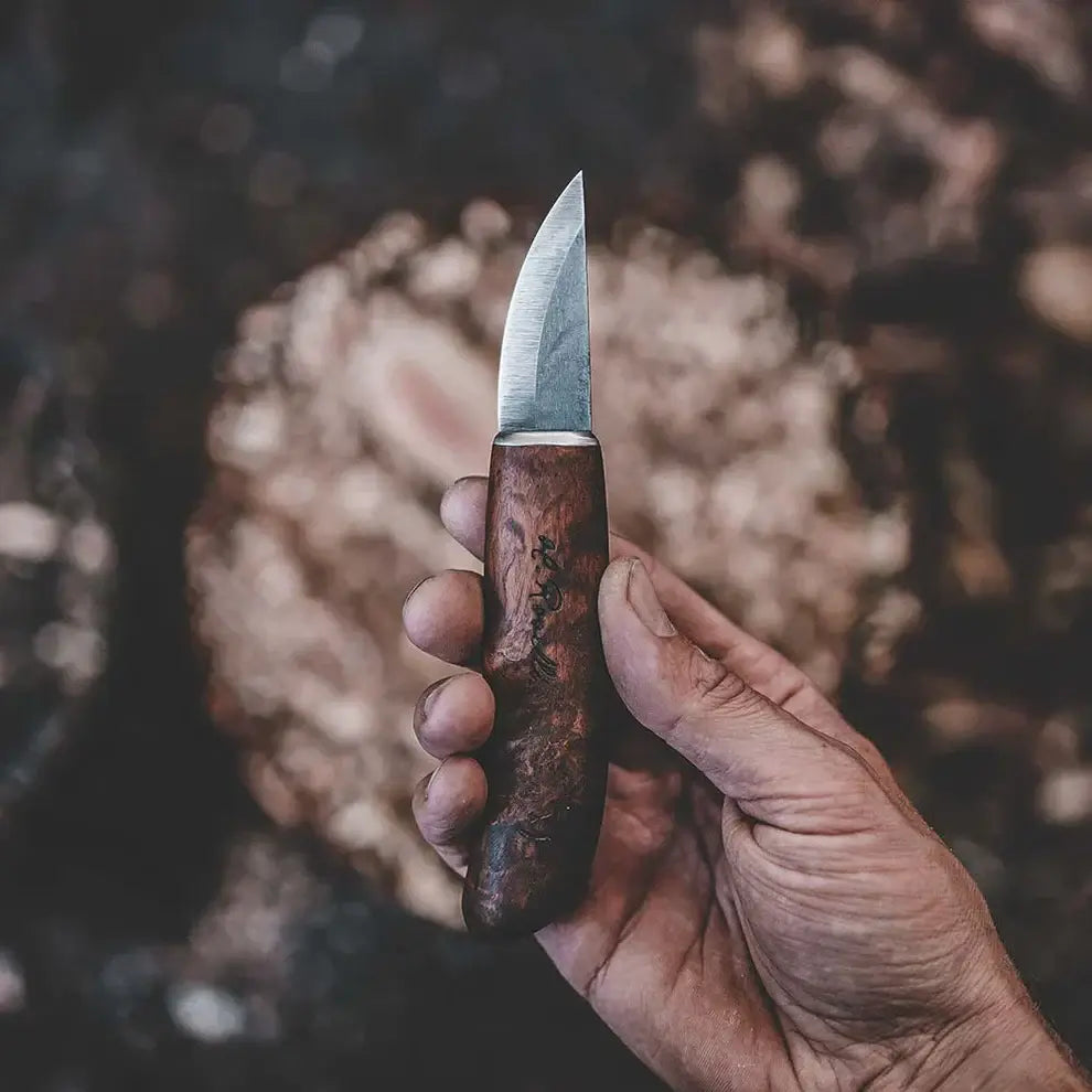 Roselli RW231 Bear Claw, UHC Steel Woodcarving and Detailing Knife shown in hand with a curly birch handle.