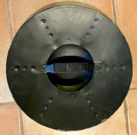 14 inch Hammered Steel Buckler Medieval Shield viewed from above with domed boss and grip.