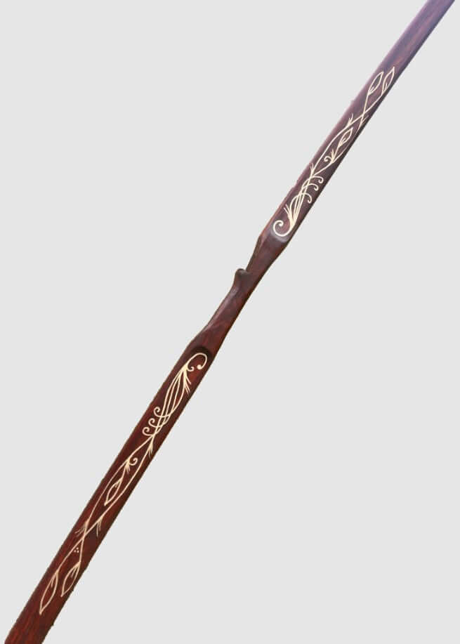 Handmade Hickory Elven Bow with elegant engravings, inspired by elvish designs from Tolkien's lore.