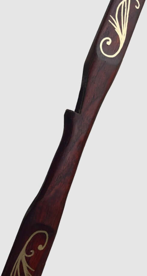 Handmade Hickory Elven Bow with elegant gold detailing on the grip, embodying elven craftsmanship.