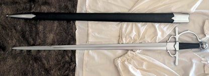 Sidesword and Buckler Shield Combo featuring an authentic sidesword and its scabbard on a soft fabric background.