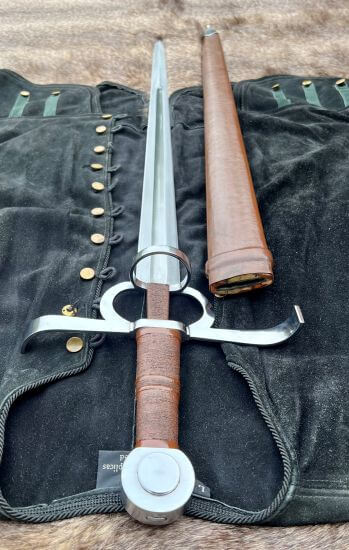 Renaissance Battle Sword and Buckler Combo displayed with scabbard on a black suede backdrop.
