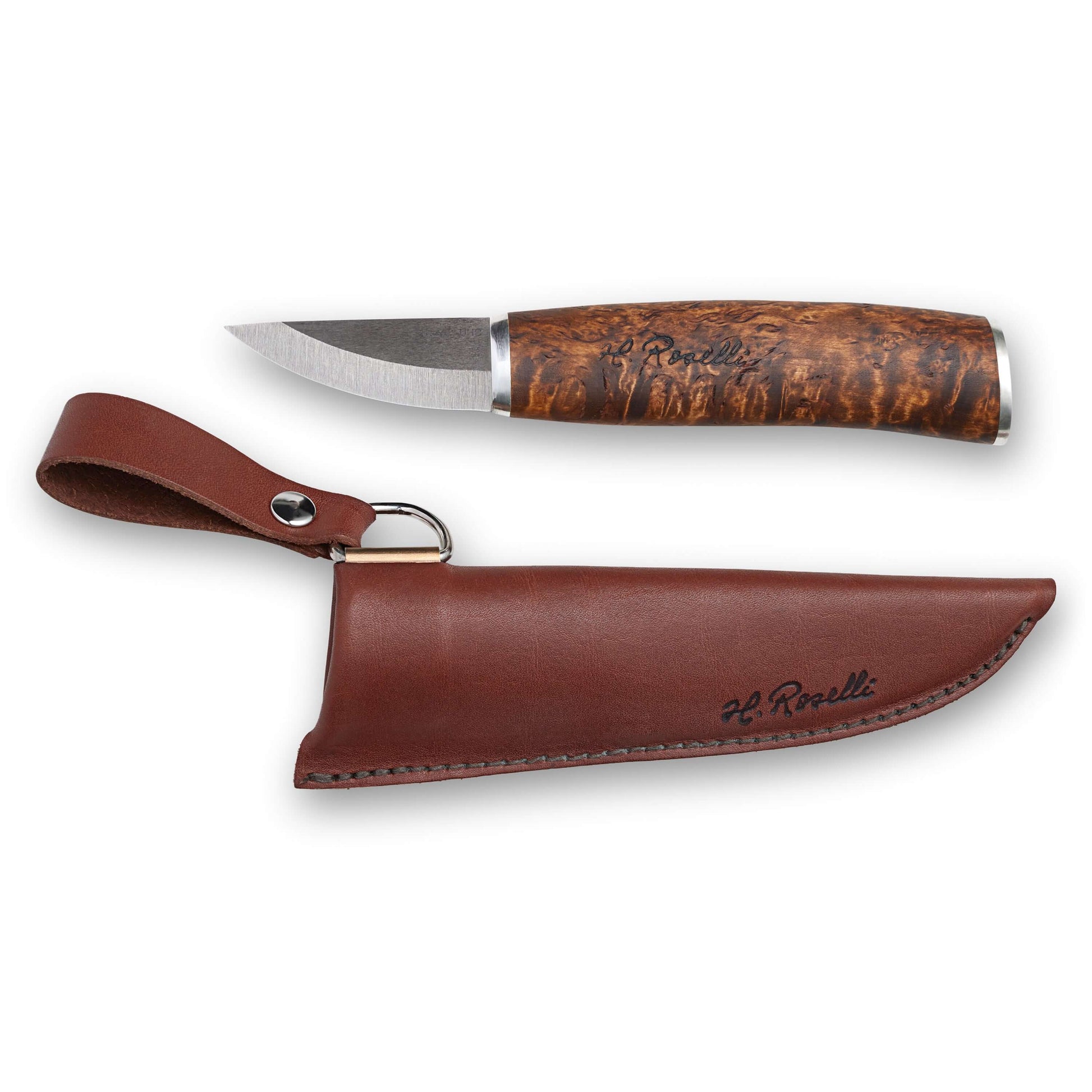Roselli Bear Claw in UHC With Silver Mounts RW231S resting in its leather sheath, showcasing the beautiful wood handle.