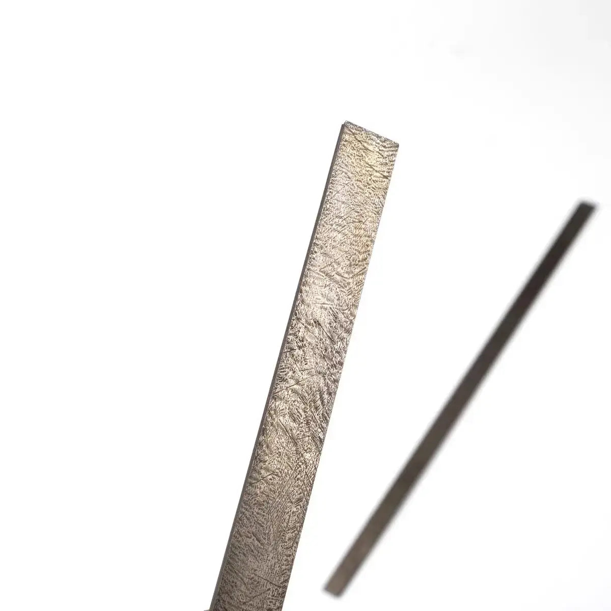 Wootz Steel Knife Making Damascus Blanks displaying a textured steel bar suitable for knife making.