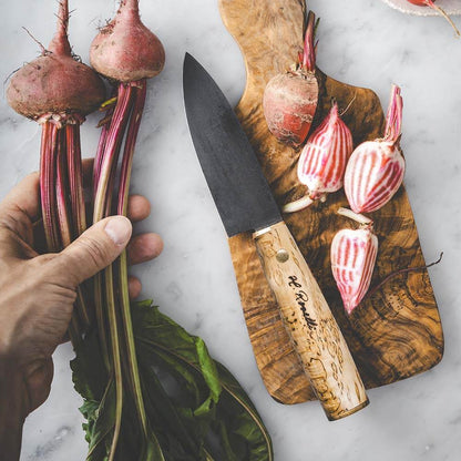 Roselli R750 The Allround - All Around Chef Knife with fresh beetroots on a wooden cutting board.